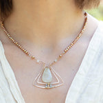 Handmade pendant necklace featuring freshwater pearls, by Art by any Means Jewelry