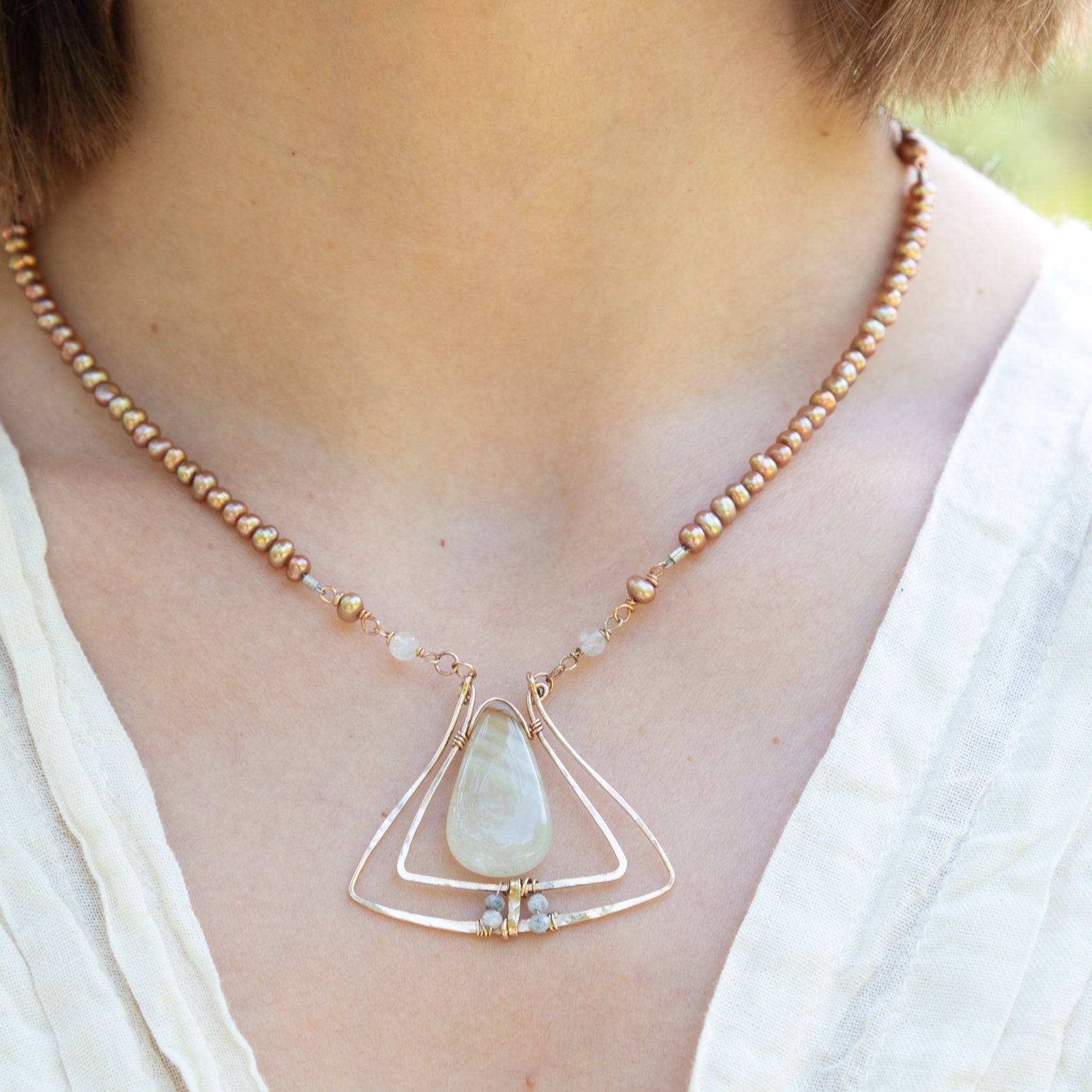 Handmade pendant necklace featuring freshwater pearls, by Art by any Means Jewelry
