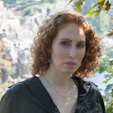Handmade opal gemstone slide necklace with brass and sterling silver pendant worn on model - Art by any Means Jewelry