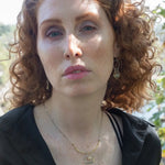 Handmade opal gemstone slide necklace with  brass and sterling silver pendant worn on model - Art by any Means Jewelry