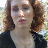Handmade opal gemstone slide necklace with  brass and sterling silver pendant worn on model - Art by any Means Jewelry