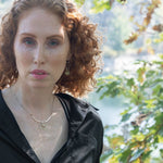Handmade opal gemstone slide necklace with brass and sterling silver pendant worn on model - Art by any Means Jewelry