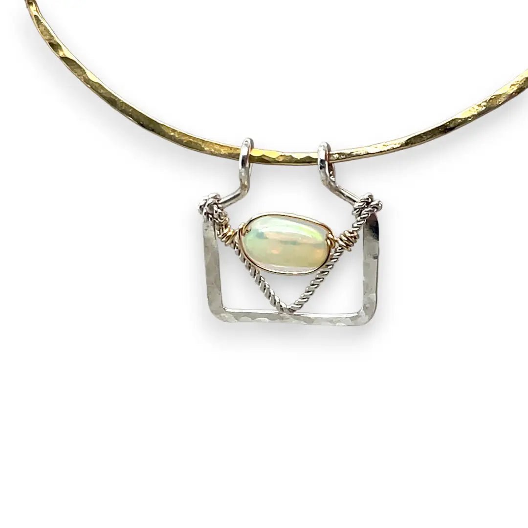 Handmade opal gemstone slide necklace with brass and sterling silver pendant worn on model - Art by any Means Jewelry