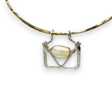Handmade opal gemstone slide necklace with brass and sterling silver pendant worn on model - Art by any Means Jewelry