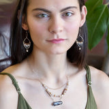 Sterling silver earrings with brass above fresh water pearl and labradorite gemstones with a champagne color pearl dangle