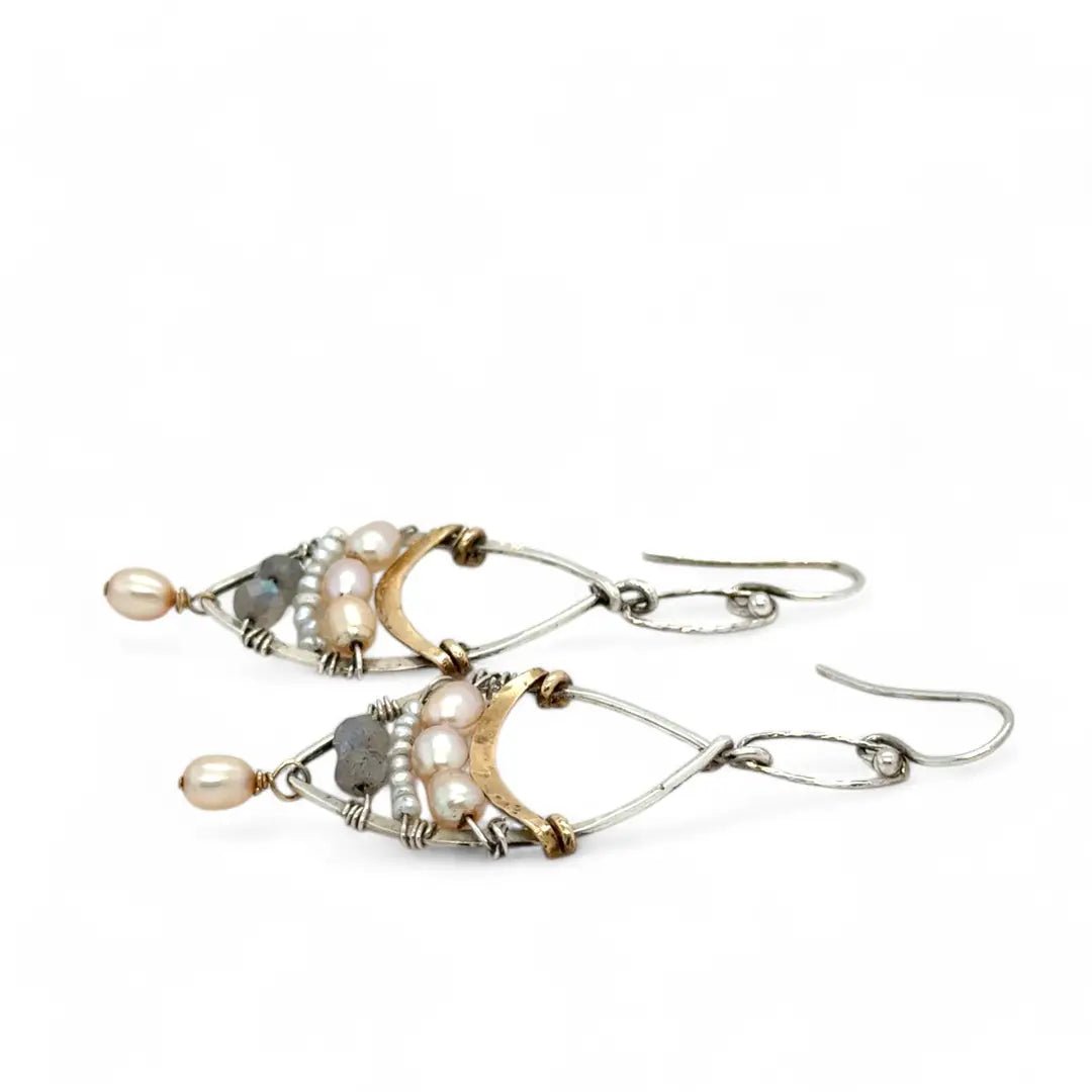 Sterling silver earrings with brass above fresh water pearl and labradorite gemstones with a champagne color pearl dangle