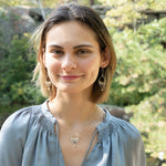 Handmade necklace featuring freshwater pearls in a leaf-inspired design, by Art by any Means Jewelry