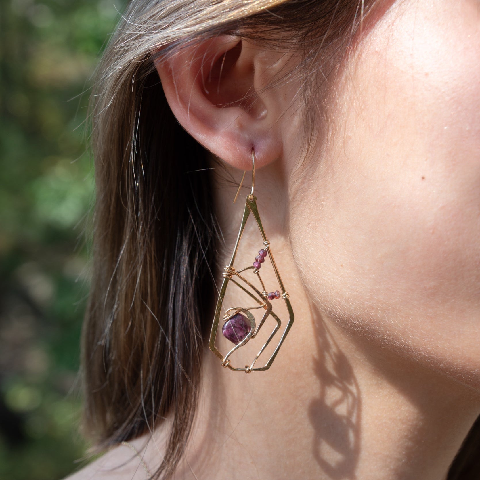 Handmade drop earrings featuring ruby gemstones in a terraced design, by Art by any Means Jewelry