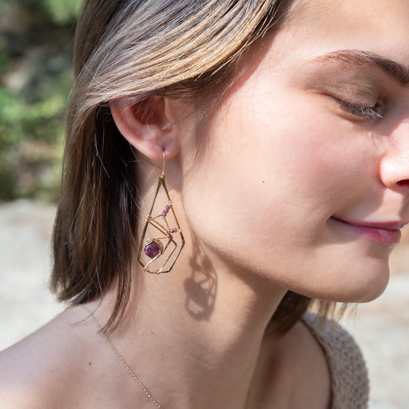 Handmade drop earrings featuring ruby gemstones in a terraced design, by Art by any Means Jewelry
