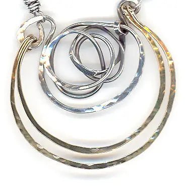 Handmade hammered and darkened sterling silver knot with hammered bronze large arches on sterling silver tube chain necklace