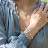Handmade hammered sterling silver cuff bracelet with freshwater pearls, by Art by any Means Jewelry