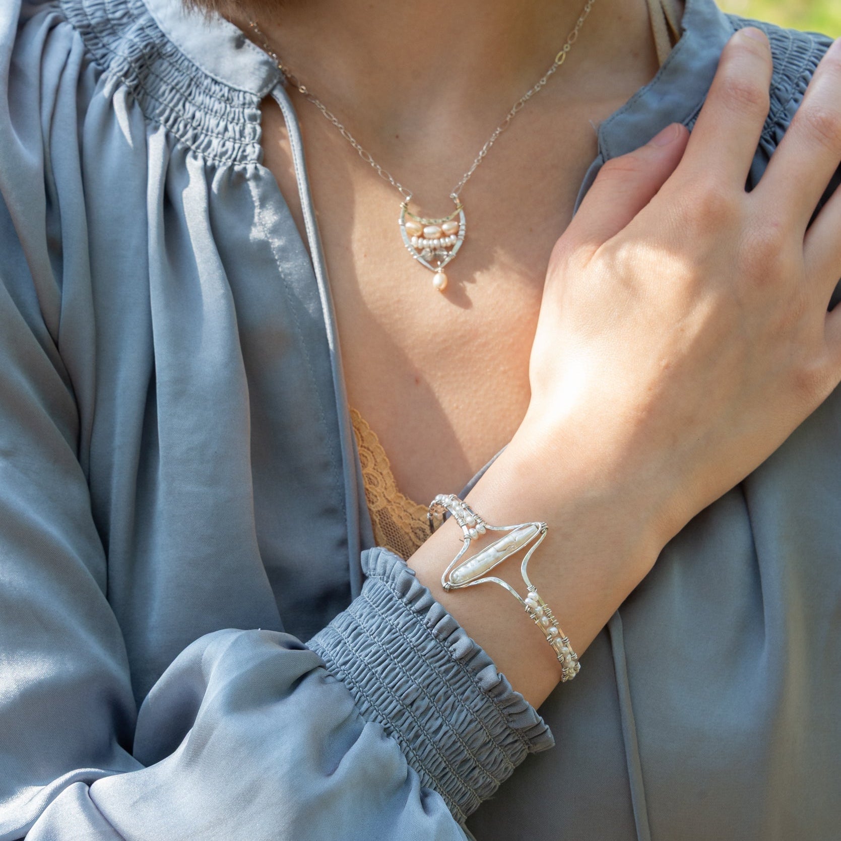 Handmade hammered sterling silver cuff bracelet with freshwater pearls, by Art by any Means Jewelry