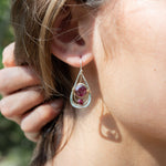 Handmade drop earrings featuring faceted garnet gemstones, by Art by any Means Jewelry