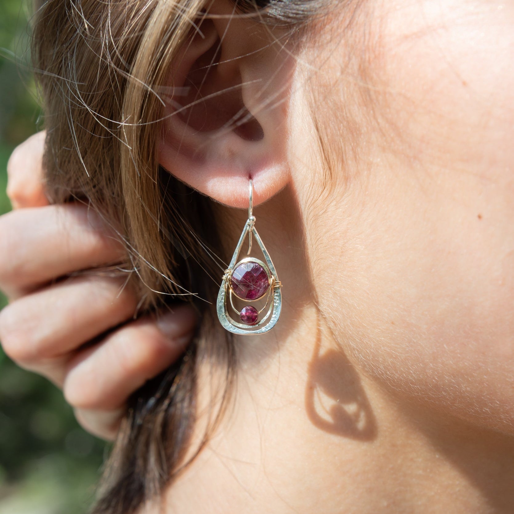 Handmade drop earrings featuring faceted garnet gemstones, by Art by any Means Jewelry