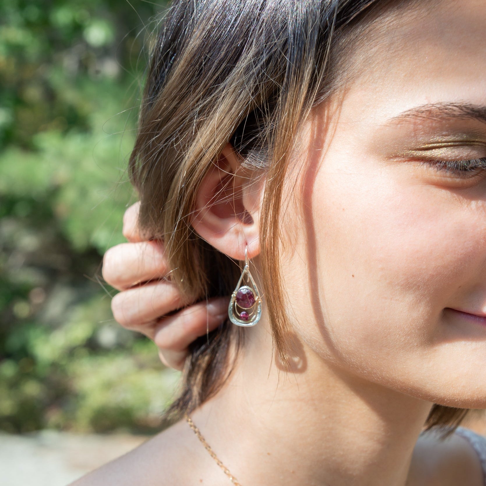 Handmade drop earrings featuring faceted garnet gemstones, by Art by any Means Jewelry