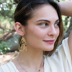 Handmade earrings featuring tourmaline gemstones in a garden-inspired design, by Art by any Means Jewelry