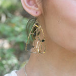 Handmade earrings featuring tourmaline gemstones in a garden-inspired design, by Art by any Means Jewelry