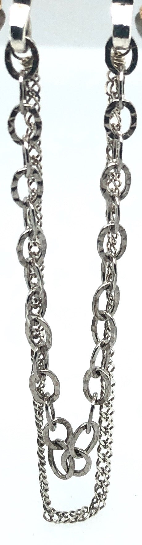 Two textured substantial sterling silver chains give this necklace luxurious drape.