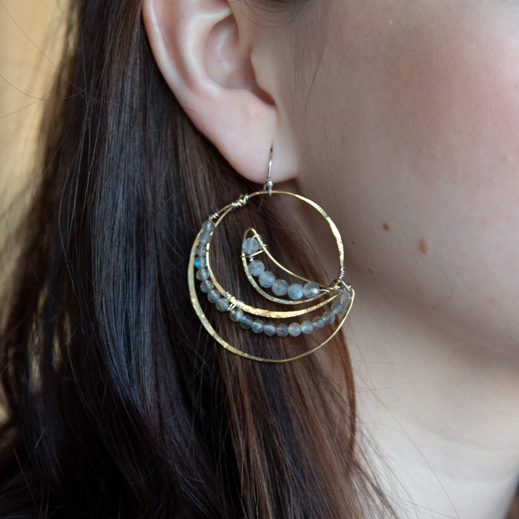 Lightweight brass handmade hammered statement hoop earrings lined with labradorite faceted gemstones