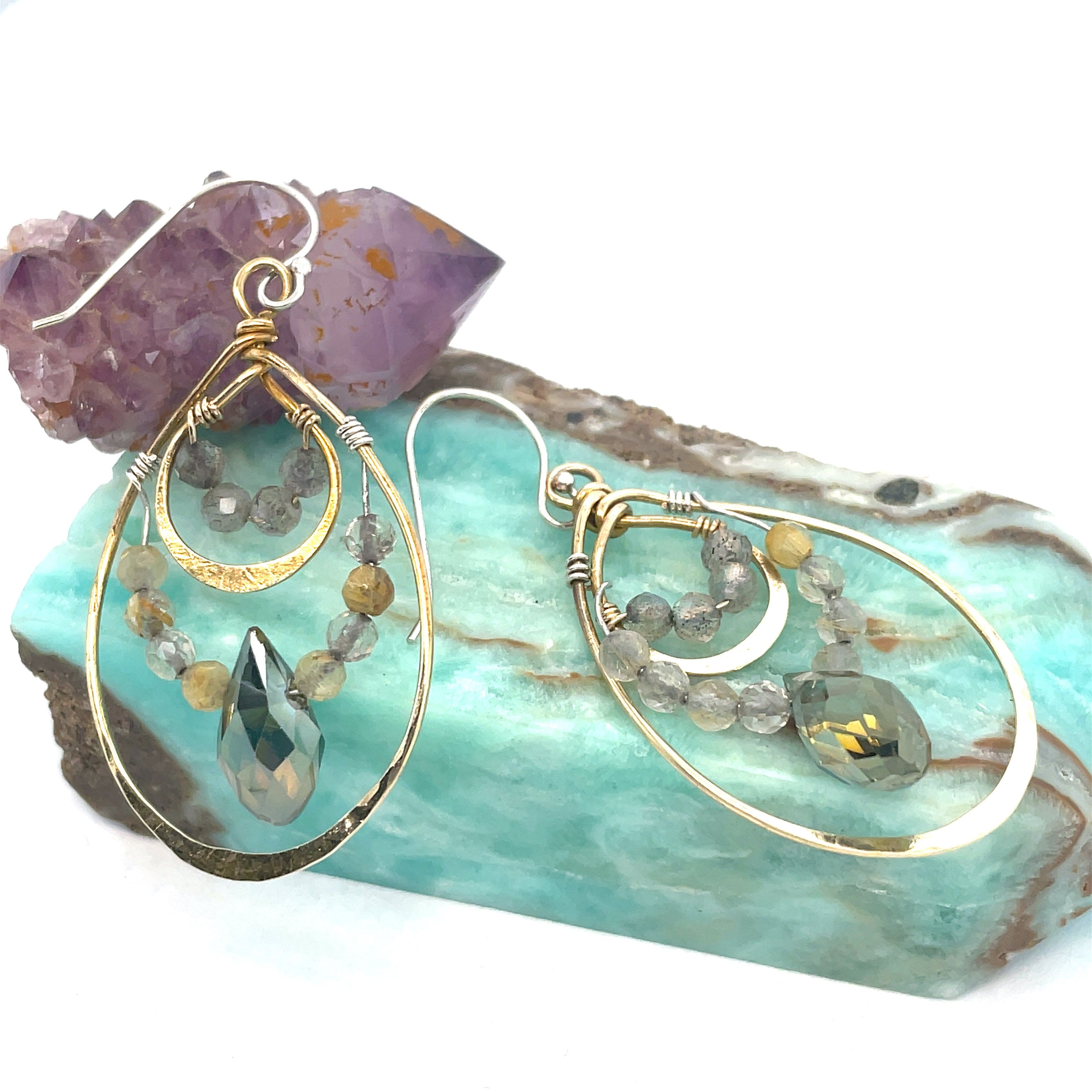 Double drop brass earrings with rutilated quartz, labradorite faceted gemstones, and a blue green crystal drop held on gold-filled and sterling silver wires
