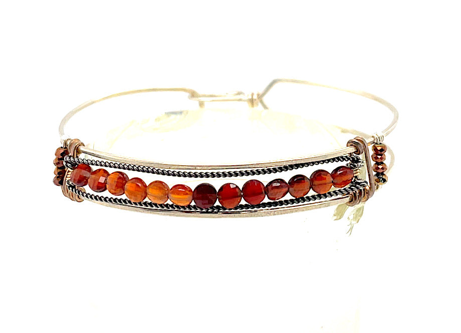 Sterling silver skinny bracelet with hessonite garnet coins and pyrite gemstones, lined with oxidized sterling silver twist wires