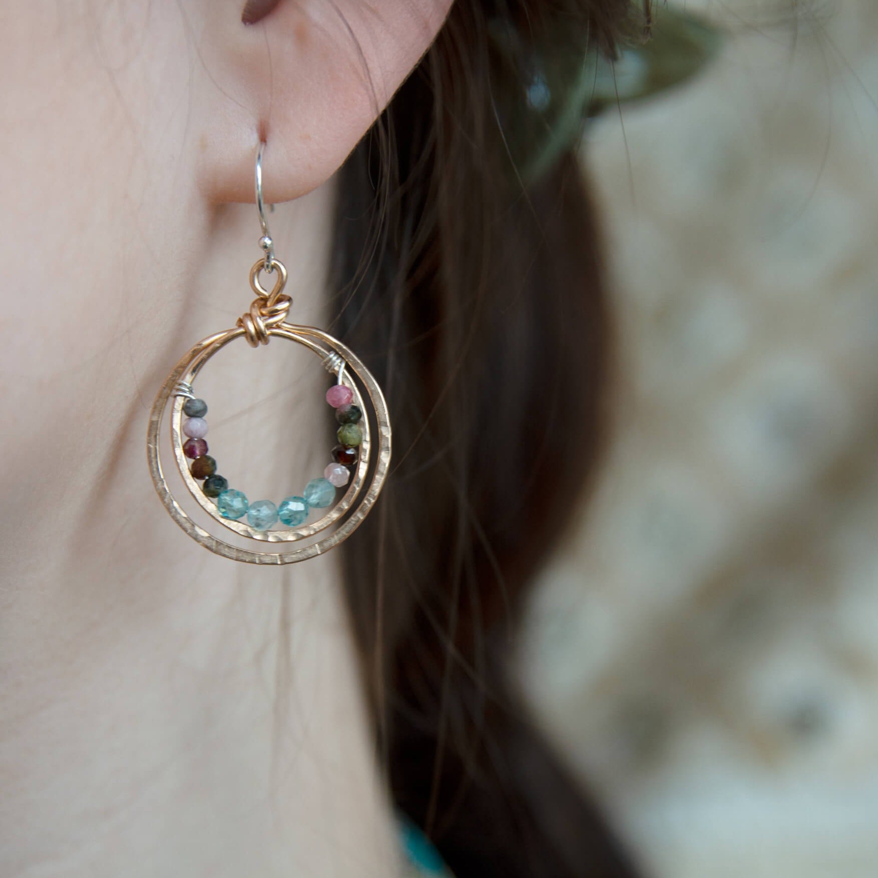 Handmade stamped double bronze mini hoop with apatite and tourmaline faceted gemstones