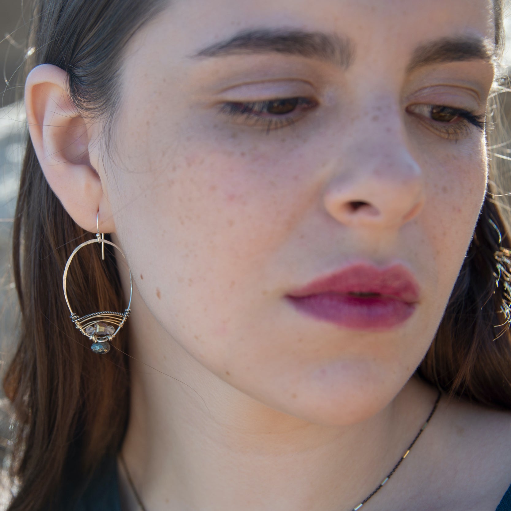 Sterling silver earrings woven with gold filled wire, crystal cubes, rutilated quartz, and pyrite drop gemstones
