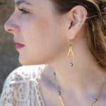 Brass overlapping hammered drops with a singular silver blue fresh water pearl dangle