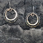 Hammered bronze ring earrings with a double ring of pyrite gemstones on sterling silver wire