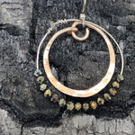 Hammered bronze ring earrings with a double ring of pyrite gemstones on sterling silver wire