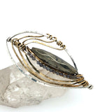 Adjustable sterling silver and brass taro leaf bracelet with built in pyrite large gemstone lined with labradorite gemstones