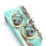 mauve moonstone and opal faceted gemstones held within a brass hammered ring hanging onto a sterling silver teardrop link mini earrings