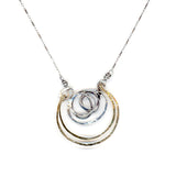 Handmade hammered and darkened sterling silver knot with hammered bronze large arches on sterling silver tube chain necklace