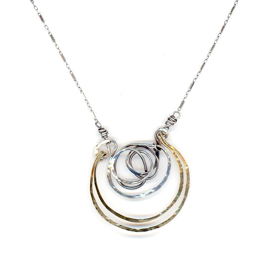 Handmade hammered and darkened sterling silver knot with hammered bronze large arches on sterling silver tube chain necklace
